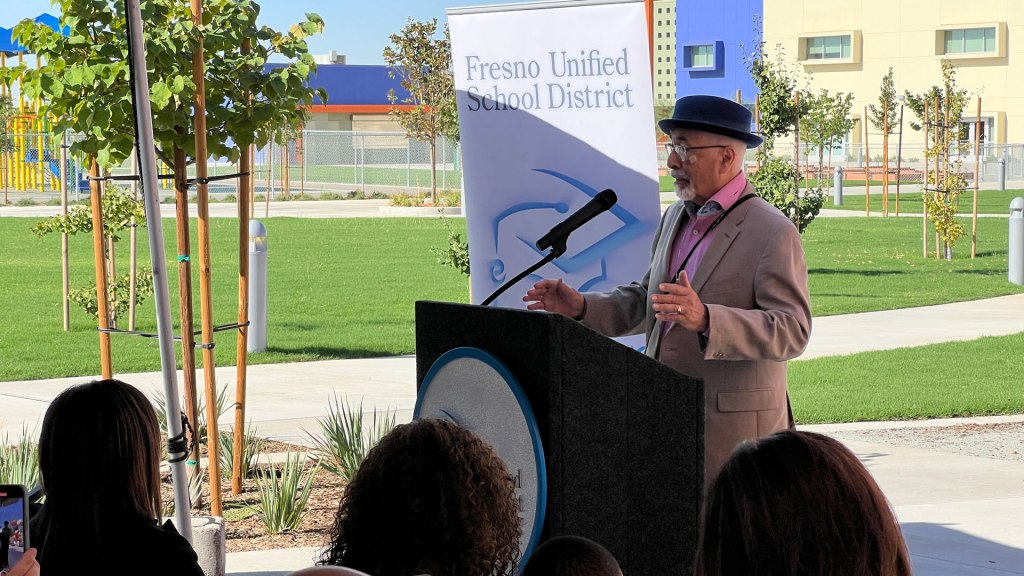 Juan Felipe Herrera addresses the crowd.