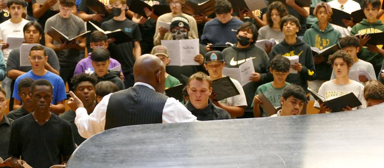 Dr. Jeffery L. Ames conducts the final song in the festival.