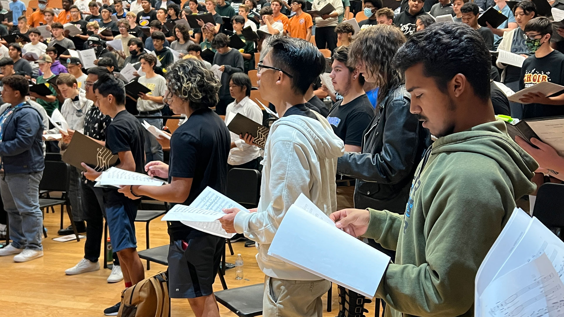 High School students sing in final performance.