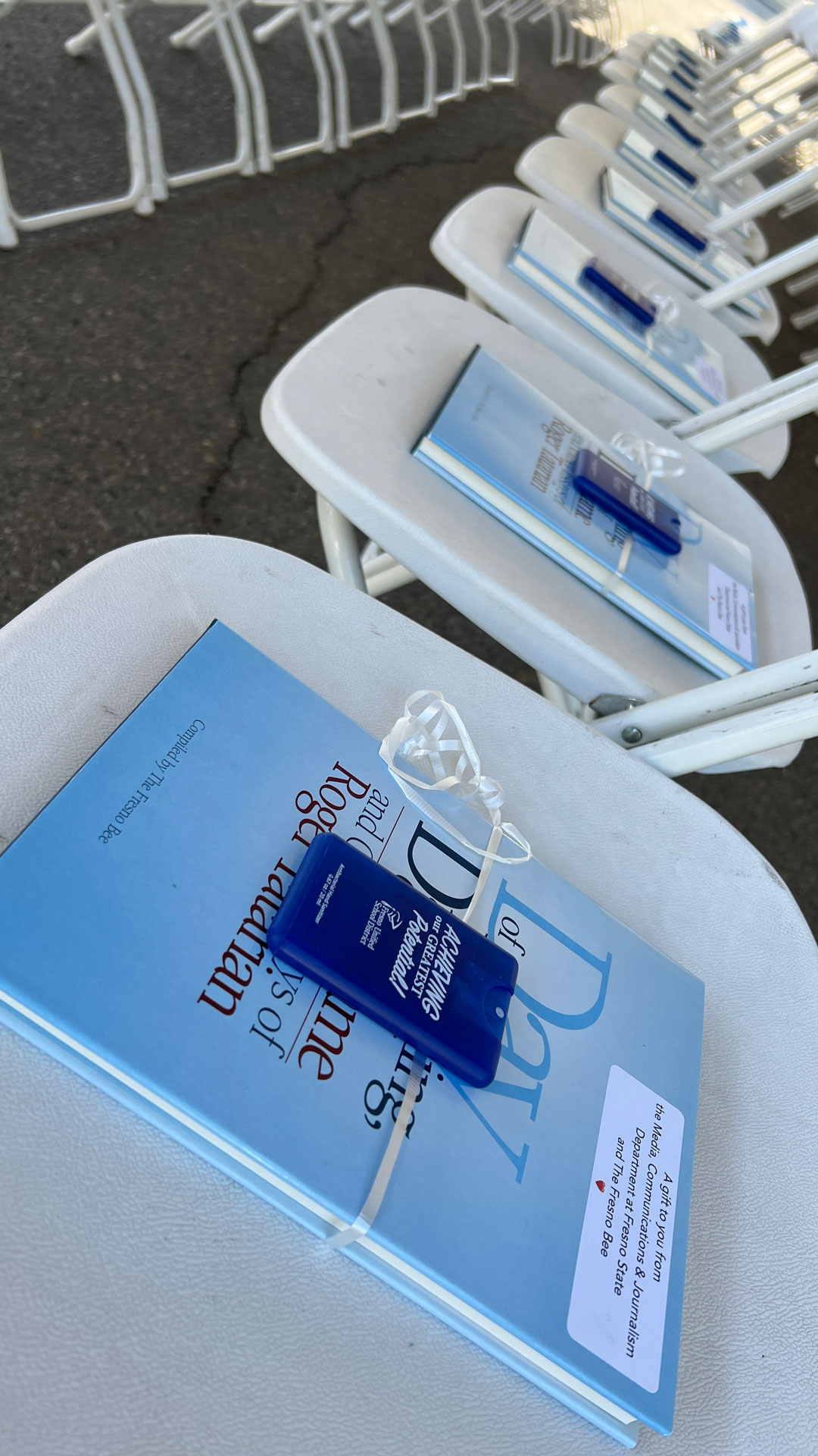 "Day of Mourning, Day of Shame" book by Roger Tatarian was placed on each seat ahead of the ceremony.