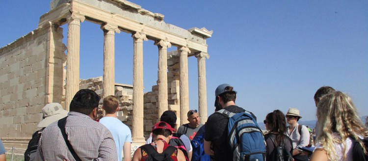 the image shows many Fresno State students in abroad, site seeing.
