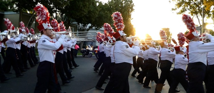 The Fresno State Bulldog Marching Band marches into Valley Children's Stadium.