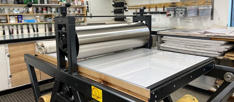 The press is a Takach Floor Model Etching/Relief Press, the 3460 model.