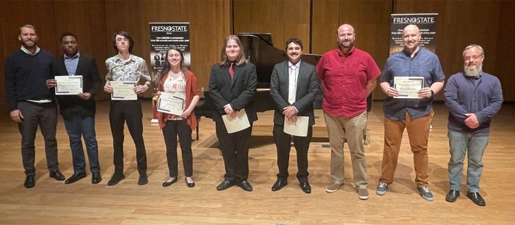 Marcus, second to last on the right, with fellow composition finalists and judges Professor Cannell, Professor Byers, and Professor Lamb.