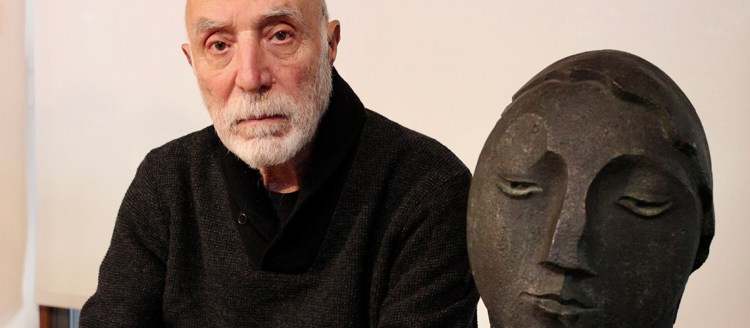 Artist Yervant Gojabashian with one of his sculptures.