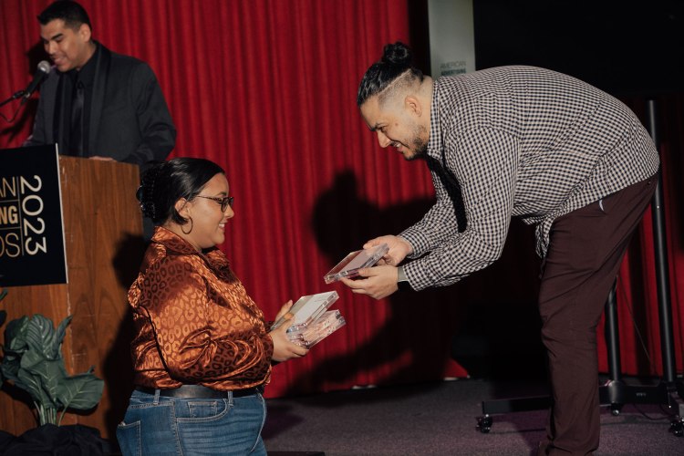 Alicia Benitez adds to her stack of awards.