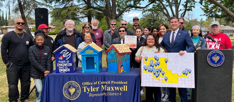Fresno City Council President Tyler Maxwell holds a press conference announcing his “On the Same Page Campaign" at University Park in Central Fresno.