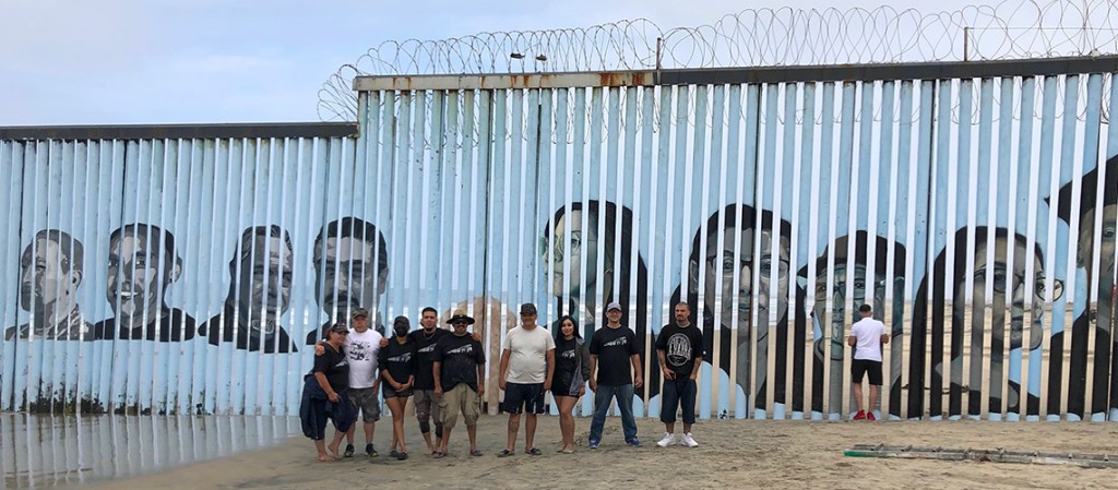 Playas de Tijuana mural volunteers on the Tijuana Beach.