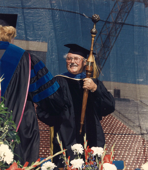 Eugene Zumwalt serves as grand marshal and mace-bearer of the university’s 85th Commencement in 1996. Photo by Chappell Studio.