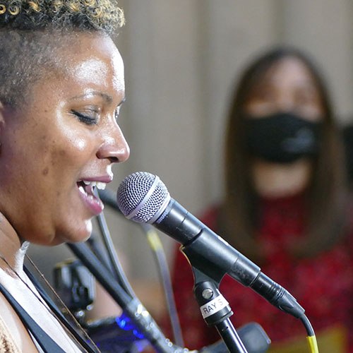 Faylita Hicks performs at the "Nobody Promised You Tomorrow: Art 50 Years After Stonewall" exhibit at Fresno State.