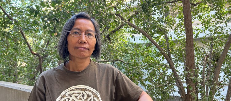 Dr. Niken Adisasmito-Smith poses for a photo.