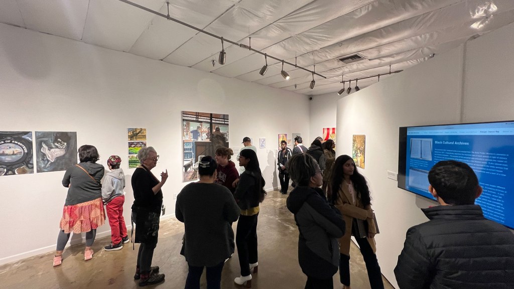 Students present their art and projects at the M Street Gallery in Downtown Fresno during Art Hop.