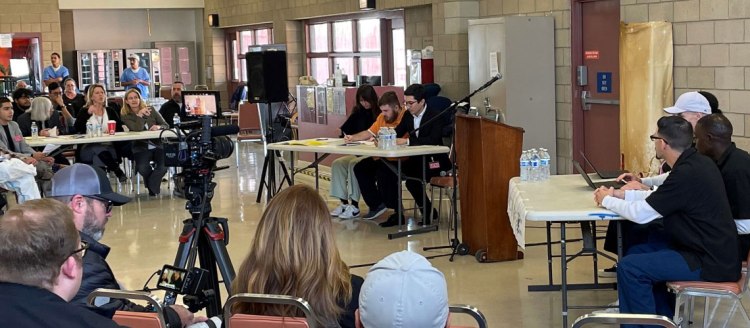 The Valley State Prison Debate Team faces off against Fresno State. Photo courtesy of CDCR.