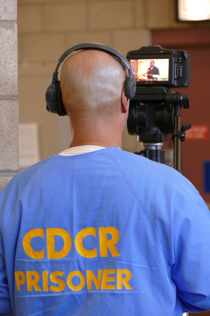A Valley State Prison incarcerated person operates a camera that streamed the event to family members.