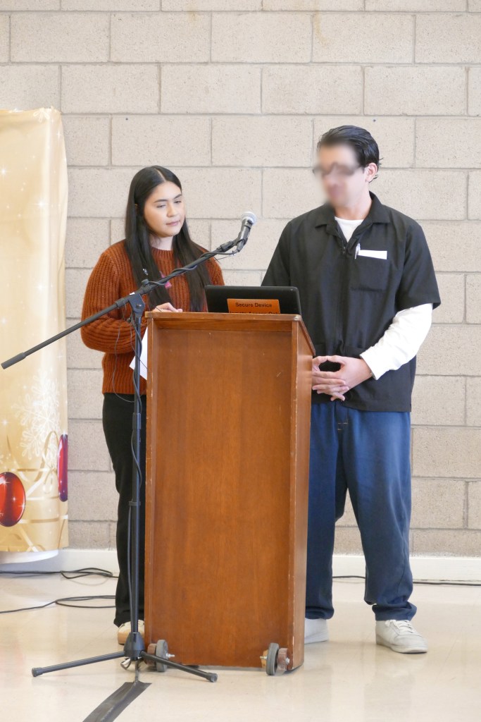A cross examination between a Fresno State Debate Team member and a Valley State Prison Debate Team member.