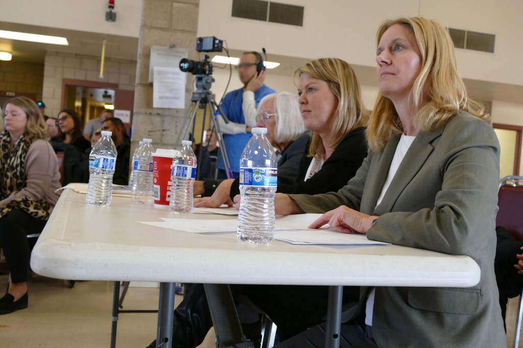 Judges watch the debate.