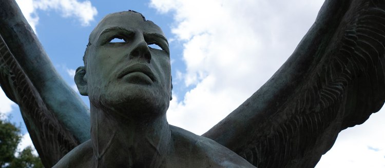 "El Teimpo" green patina bronze sculpture by Jorge Marín depicts a winged man with hollow eyes