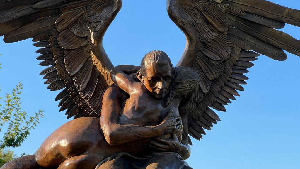 El Abrazo Monumental - 2006 | 7.2 x 6.9 x 2.1 ft - An intimate moment of absolute compassion and devotion. Two bodies that strive to become one. In this sculpture, a winged man holds a woman who seems to be slipping away from her, as if he's witnessing her last breath from her in a moment of transcendence.