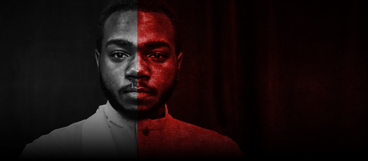 The face of a black man with a mustache on a black backround. Half of his face is in black and white, the other half is monochrome with a red tint.