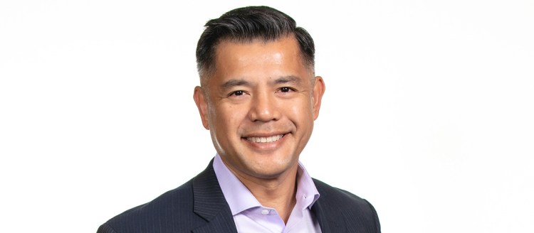 Ron Ballecer head shot on a white background