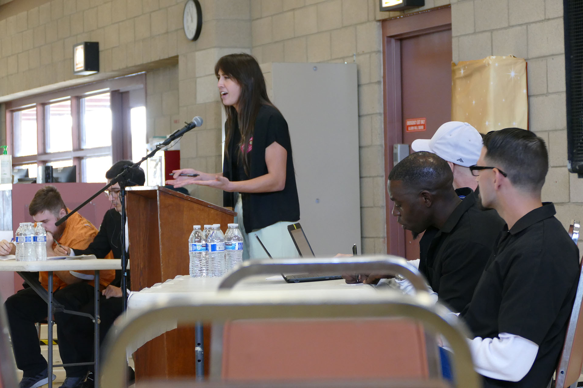 Rhiannon Genilla at the podium during the debate.